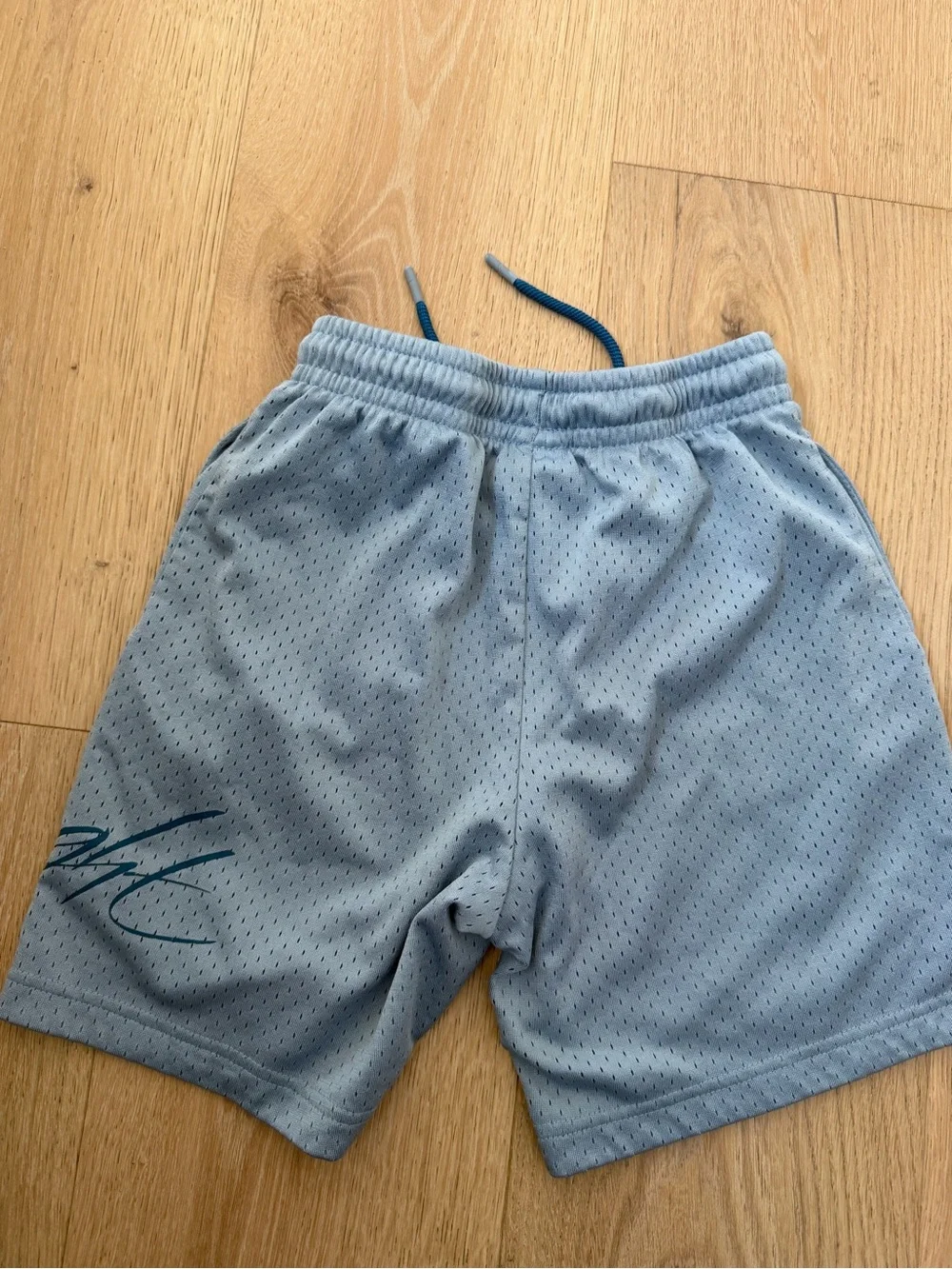 Boy’s Jordan Light Blue Mesh Athletic Shorts with Drawstring